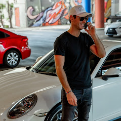 Car Superstore customer beside a vehicle